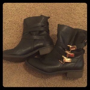 Black leather buckle boots